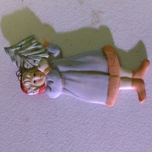 Christmas Ornament. Girl with tree.